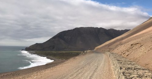 This photo provided by Bernardo Arriaza shows the coast where scientists found evidence of ancient smallpox infections, Camarones coast, Northern Chile, Nov. 2, 2018. (AP Photo)