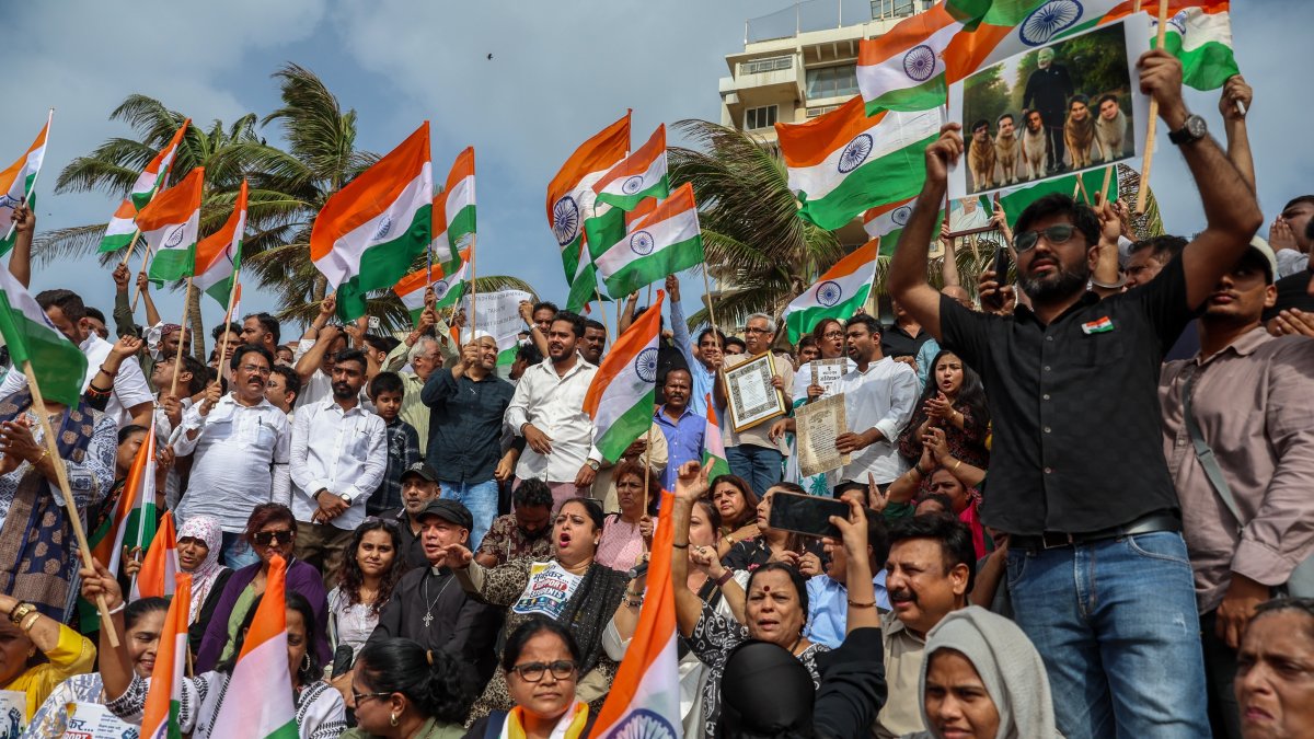 Supporters of the youth-led satirical political movement Cockroach Janta Party (CJP) celebrate the resignation of Union Education Minister Dharmendra Pradhan, Mumbai, India, July 25, 2026. (EPA Photo)