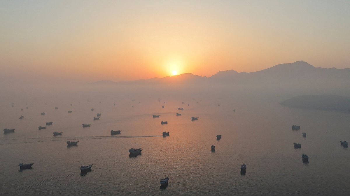 A drone view shows vessels in the Strait of Hormuz, as seen from Musandam, Oman, June 15, 2026. (Reuters Photo)
