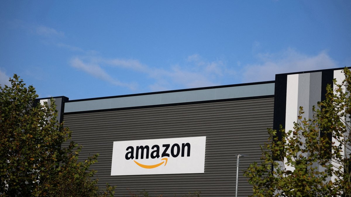 Amazon logo outside an Amazon warehouse in Manchester, U.K., Oct. 28, 2025. (Reuters Photo)