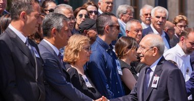 CHP chair Kemal Kılıçdaroğlu (R) shakes hands with Özgür Özel during a funeral, Ankara, Türkiye, June 25, 2026. (AA Photo)