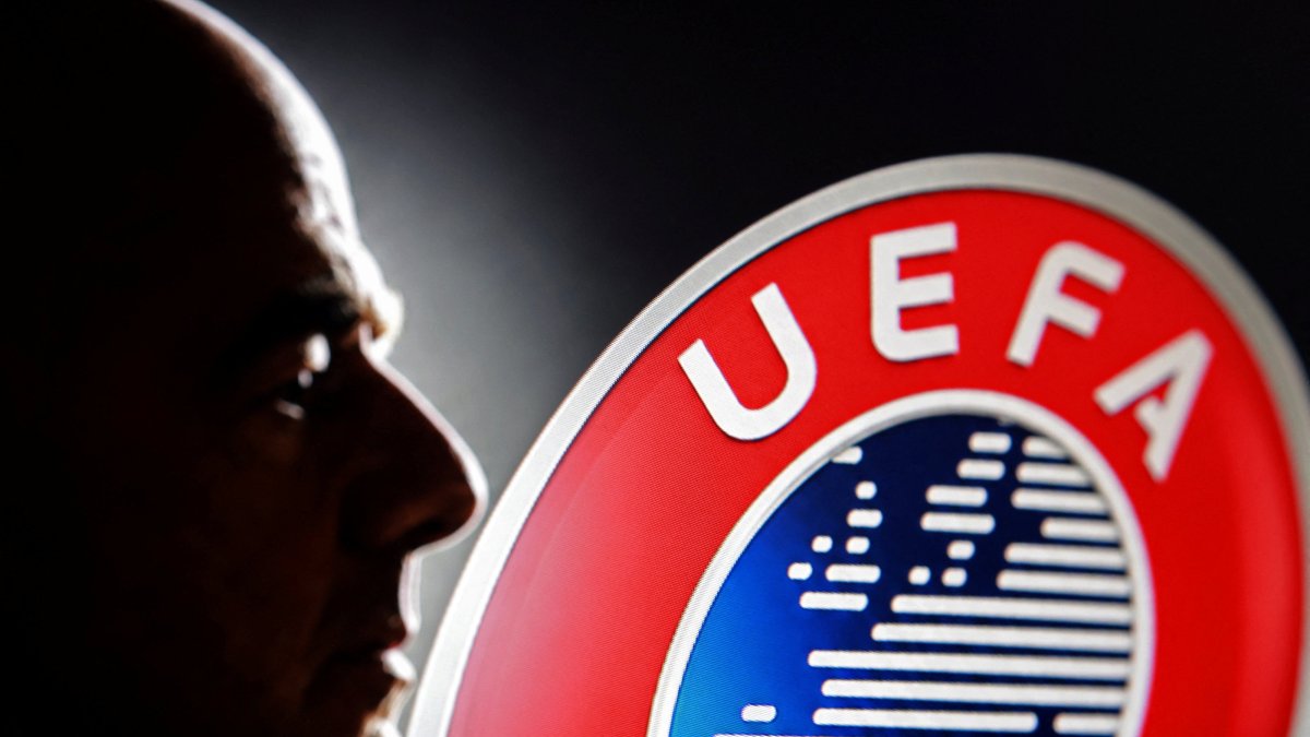 A silhouette depicting FIFA President Gianni Infantino is seen next to a UEFA logo in this illustration taken July 30, 2026. (Reuters Photo)