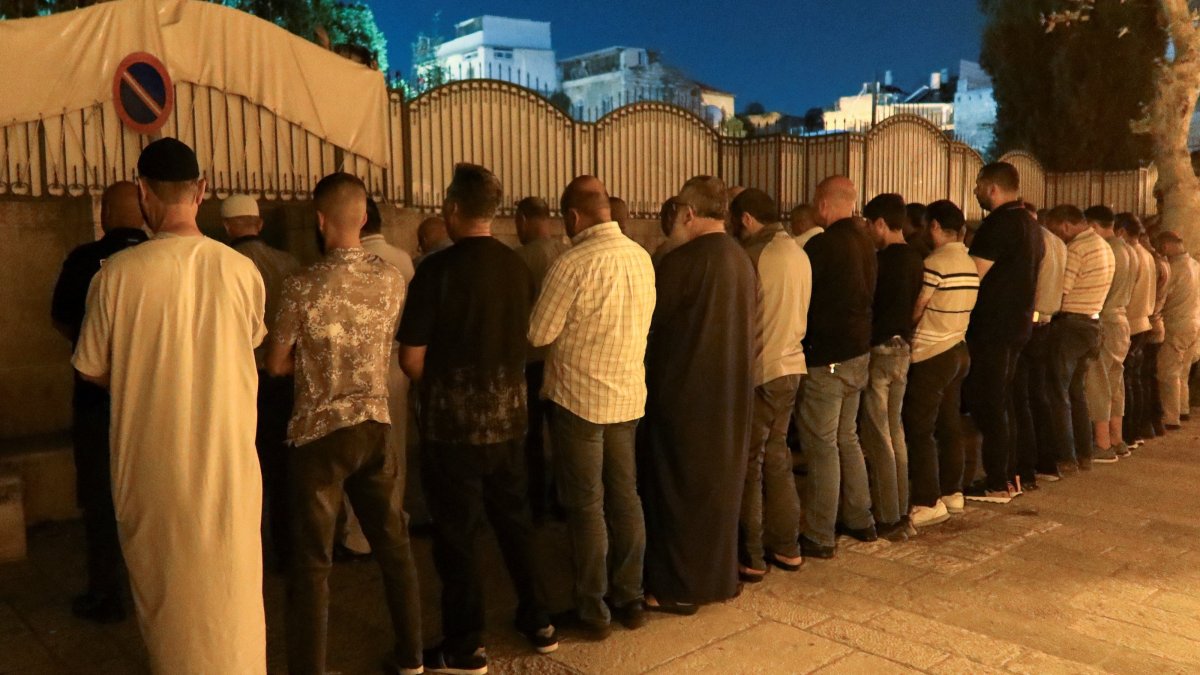Palestinian worshippers pray outside Al-Aqsa Mosque as Israeli police imposed age restrictions on entry, occupied East Jerusalem, Palestine, July 23, 2026. (Reuters Photo)