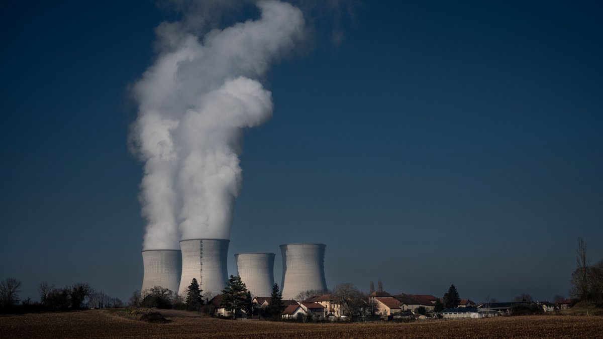 A photograph shows vapor rising from cooling towers of the Bugey nuclear power plant, Saint-Vulbas, France, Jan. 25, 2022. (AFP Photo)