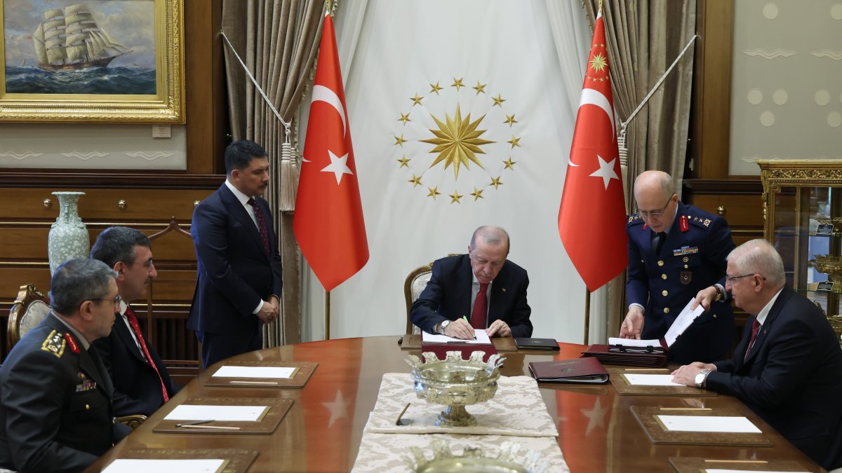 President Recep Tayyip Erdoğan signs the document on the promotion of military officers after the Council meeting, Ankara, Türkiye, Aug. 4, 2026. (AA Photo)