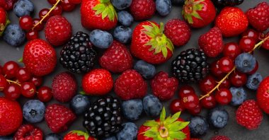 A close-up view of an assortment of fresh berries, including strawberries, raspberries, blackberries and blueberries. (Shutterstock Photo)
