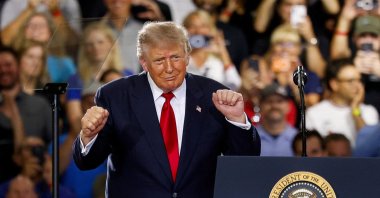 U.S. President Donald Trump dances as he delivers remarks on the economy at the General Motors Proving Ground in Milford, Michigan, U.S., July 27, 2026. (Reuters Photo)