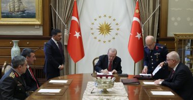 President Recep Tayyip Erdoğan signs the document on the promotion of military officers after the Council meeting, Ankara, Türkiye, Aug. 4, 2026. (AA Photo)