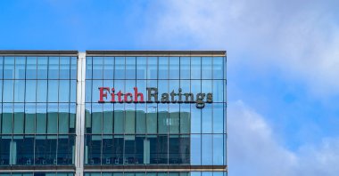 The logo of Fitch Ratings is on the rooftop of its U.K. headquarters in the Canary Wharf financial district in London, United Kingdom, Dec. 26, 2025. (Reuters Photo)
