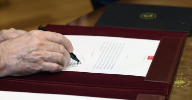 President Recep Tayyip Erdoğan signs decisions made at the Supreme Military Council (YAŞ), Ankara, Aug. 4, 2026. (AA Photo)