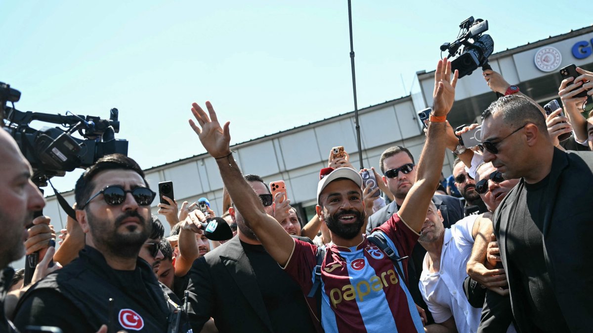 Egyptian forward Mohamed Salah gestures as he arrives at Istanbul Ataturk Airport to complete his transfer to Turkish football club Trabzonspor, Istanbul, Türkiye, Aug. 5, 2026. (AP Photo)