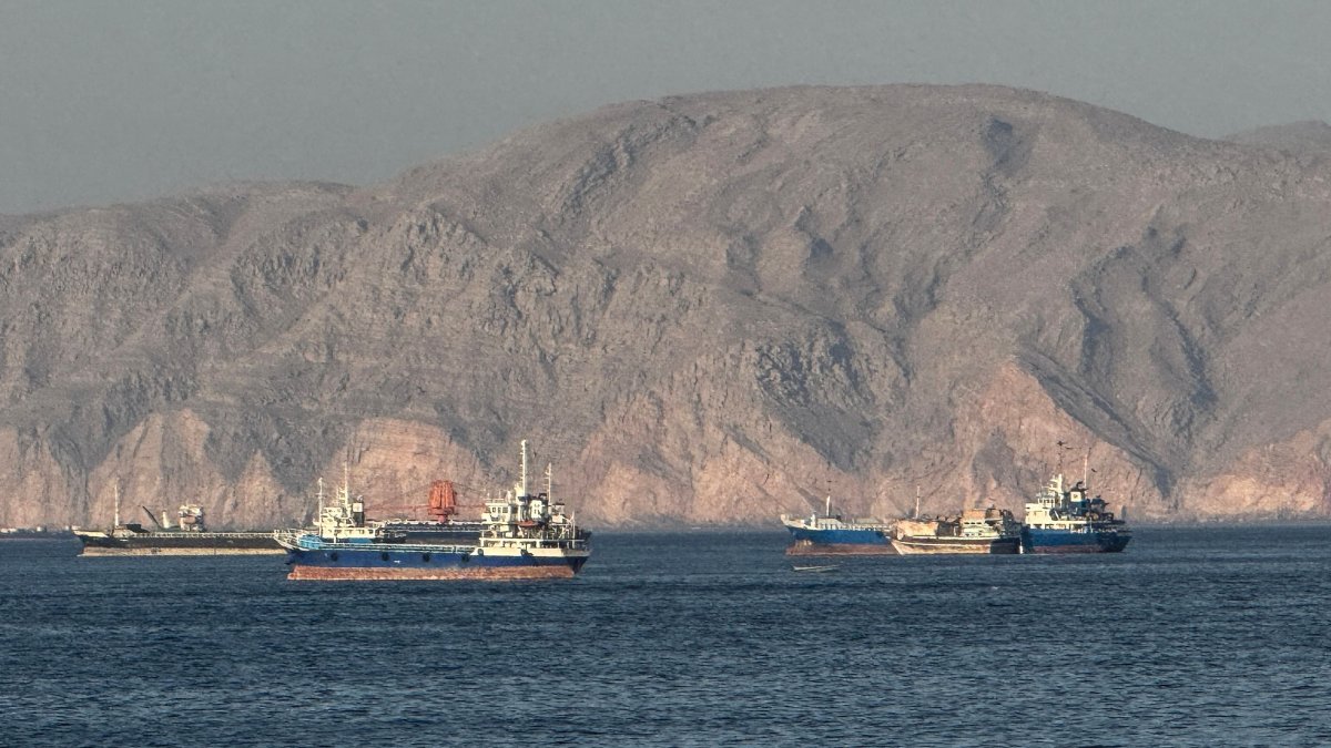 Vessels are seen anchored in the Strait of Hormuz, off the port city of Khasab on Oman’s northern Musandam Peninsula on May 17, 2026. (AFP File Photo)