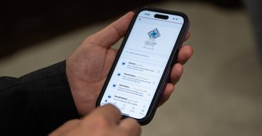The Turkish Historical Society's Encyclopedic Dictionary of Turkish History mobile application is displayed on a smartphone, Ankara, Türkiye, Aug. 5, 2026. (AA Photo)