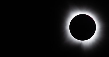 The moon fully passes over the sun's horizon during a total solar eclipse, Brady, Texas, U.S., April 8, 2024. (AFP Photo)