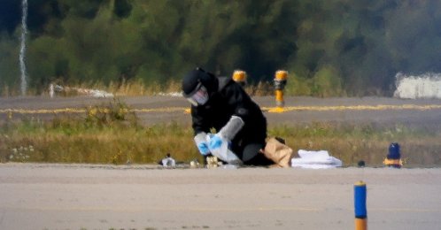 A police officer in protective clothing works at Leipzig/Halle Airport in Schkeuditz, Germany, Aug. 5, 2026. (Reuters Photo)