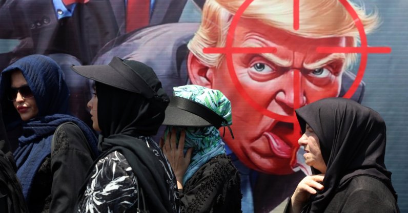 People walk past an anti-Trump banner in the streets of Tehran, Iran, Aug. 4, 2026. (EPA Photo)