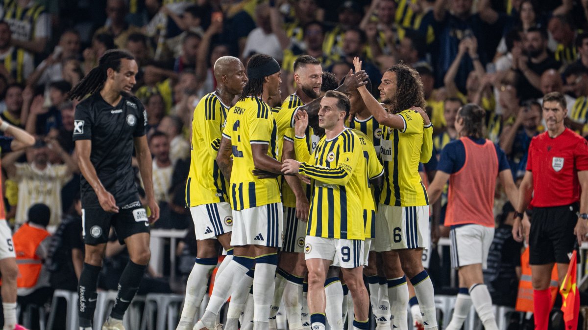 Fenerbahçe players celebrate during the UEFA Champions League third qualifying round first-leg match against Sturm Graz at Chobani Stadium, Istanbul, Türkiye, Aug. 5, 2026. (AA Photo)
