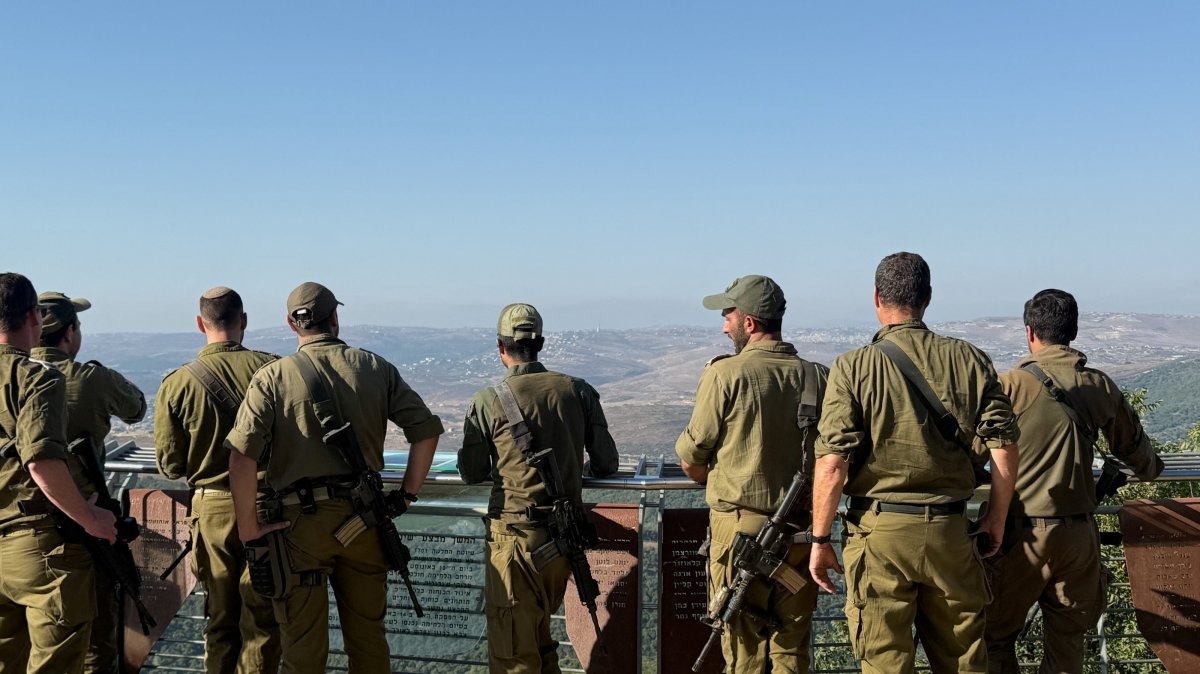 Israeli soldiers look towards Lebanon from the Israeli side of the Israel-Lebanon border in northern Israel, Aug. 5, 2026. (Reuters Photo)
