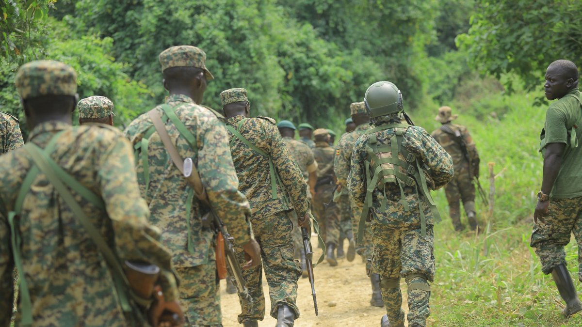 Uganda People's Defense Forces (UPDF) troops are seen on the Mbau-Kamango road in the Beni district, Dec. 8, 2021. (AFP File Photo)