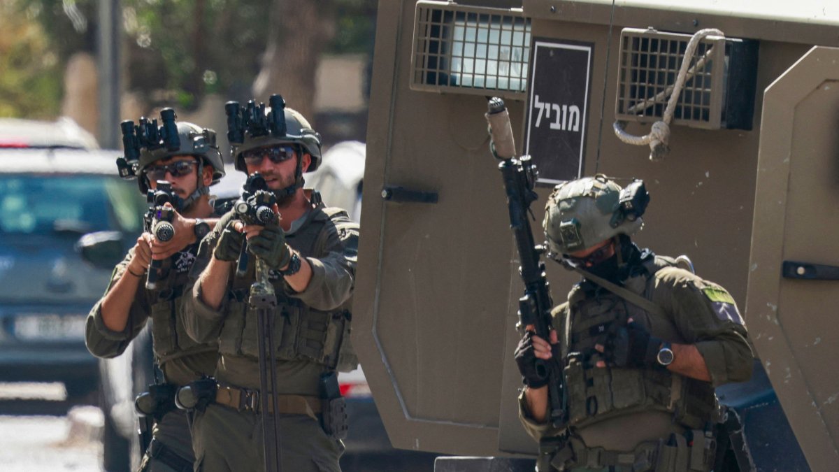 Israeli soldiers surround the Nablus Specialized Hospital, where they allegedly arrested a wounded man and his brother from inside the hospital in Nablus, in the occupied West Bank, July 24, 2026. (AFP Photo)
