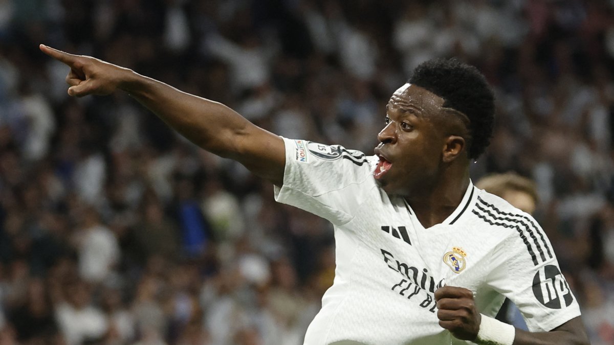 Real Madrid's Brazilian forward Vinicius Junior celebrates scoring his team's first goal during the UEFA Champions League quarterfinal second-leg football match between Real Madrid CF and Arsenal at Santiago Bernabeu Stadium in Madrid, Spain, April 16, 2025. (AFP Photo)