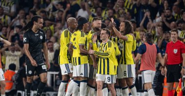 Fenerbahçe players celebrate during the UEFA Champions League third qualifying round first-leg match against Sturm Graz at Chobani Stadium, Istanbul, Türkiye, Aug. 5, 2026. (AA Photo)