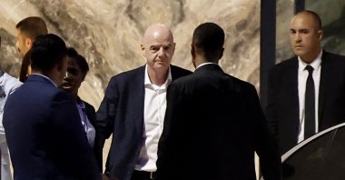 FIFA President Gianni Infantino (C) leaves Al-Madina Stadium following the 2026 Women's Africa Cup of Nations match between Malawi and Zambia, Rabat, Morocco, Aug. 5, 2026. (AFP Photo)