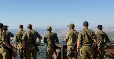 Israeli soldiers look towards Lebanon from the Israeli side of the Israel-Lebanon border in northern Israel, Aug. 5, 2026. (Reuters Photo)