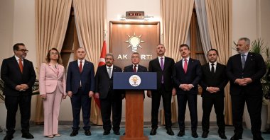 AK Party group chair Abdullah Güler (C) and lawmakers attend a news conference on the draft law, Ankara, Türkiye, Aug. 5, 2026. (AA Photo)