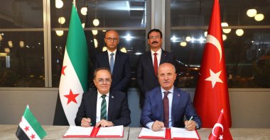 YÖK Chair Erol Özvar and Syrian Minister of Higher Education and Scientific Research Marwan al-Halabi sign the deal, Ankara, Türkiye, Aug. 6, 2026. (DHA Photo)