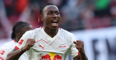 Leipzig's Ivorian forward Yan Diomande celebrates scoring the 1-1 goal during the Bundesliga football match between RB Leipzig and Augsburg in Leipzig, eastern Germany, March 7, 2026. (AFP Photo)