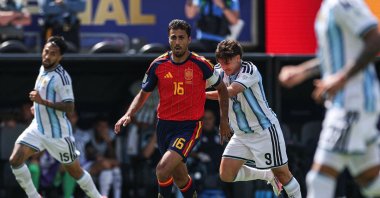Spain's midfielder Rodri and Argentina's forward Julian Alvarez fight for the ball during the 2026 World Cup football tournament final match between Spain and Argentina at the New York/New Jersey Stadium in East Rutherford, U.S., July 19, 2026.  (AFP Photo)