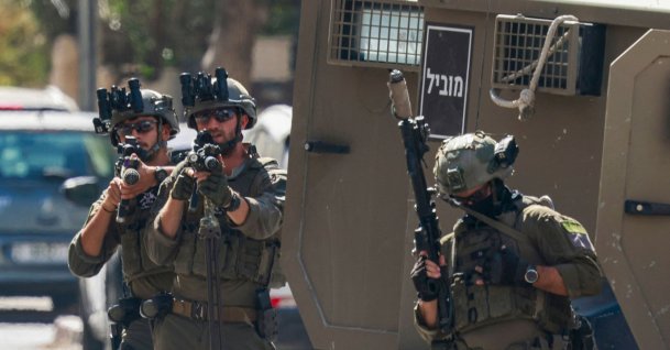 Israeli soldiers surround the Nablus Specialized Hospital, where they allegedly arrested a wounded man and his brother from inside the hospital in Nablus, in the occupied West Bank, July 24, 2026. (AFP Photo)