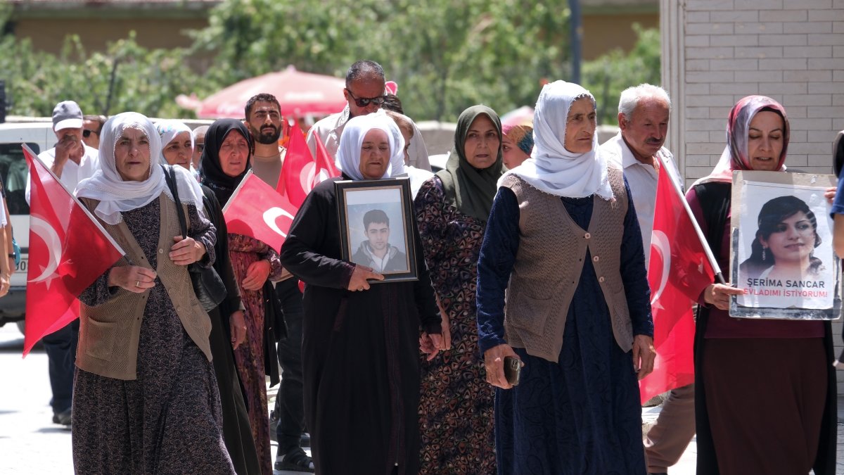 A group of women seeking the return of their children brainwashed to join the PKK carry photos of their children during a protest, Van, eastern Türkiye, July 30, 2026. (AA Photo)