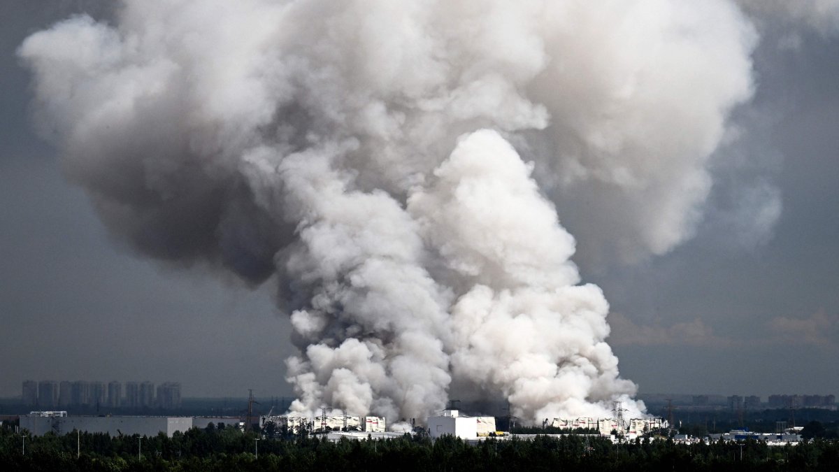 Smoke rises from a warehouse for the Russian e-commerce giant Wildberries after being hit by Ukrainian drones near Saint Petersburg, Russia, July 24, 2026. (Reuters Photo)