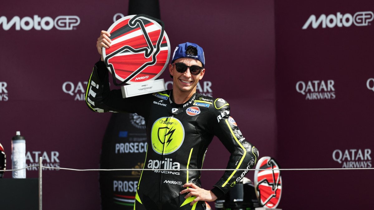 Trackhouse's Raul Fernandez celebrates with his trophy after winning the British MotoGP race at Silverstone, U.K., Aug. 9, 2026. (Reuters Photo)
SuperFile 