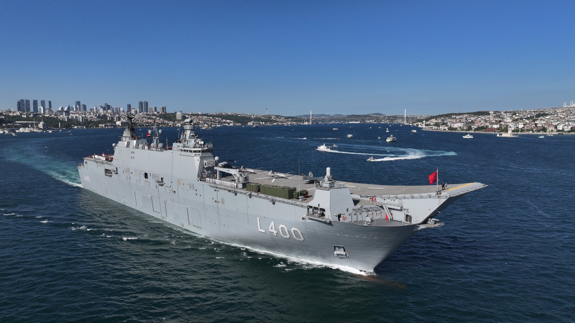 TCG Anadolu, Türkiye's first amphibious assault ship, takes part in a naval parade in the Bosporus as part of the Teknofest Blue Homeland event, Istanbul, Türkiye, Aug. 24, 2025. (AA Photo)