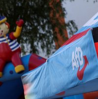 A logo of the Alternative for Germany (AfD) party at a stall during the party's campaign kick-off event ahead of the Mecklenburg-Western Pomerania state election, in Stralsund, Germany, Aug. 8, 2026. (Reuters Photo)