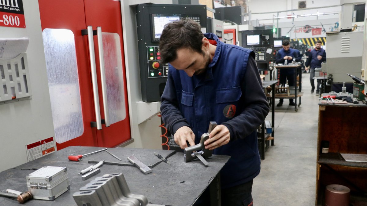 Workers are seen at an arms-making factory in Trabzon, northern Türkiye, March 4, 2026. (AA Photo)