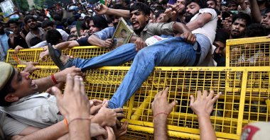 Activists and supporters of the Cockroach Janta Party (CJP) clash with police personnel during a protest, New Delhi, India, July 20, 2026. (AFP Photo)