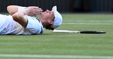 Italy's Jannik Sinner reacts to beating Germany's Alexander Zverev in the Wimbledon men's singles final, in Wimbledon, southwest London, July 12, 2026. (AFP Photo)