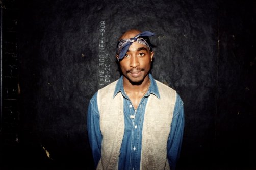 Rapper Tupac Shakur poses for photos backstage after his performance at the Regal Theater, Chicago, U.S., March 1994. (Getty Images Photo)