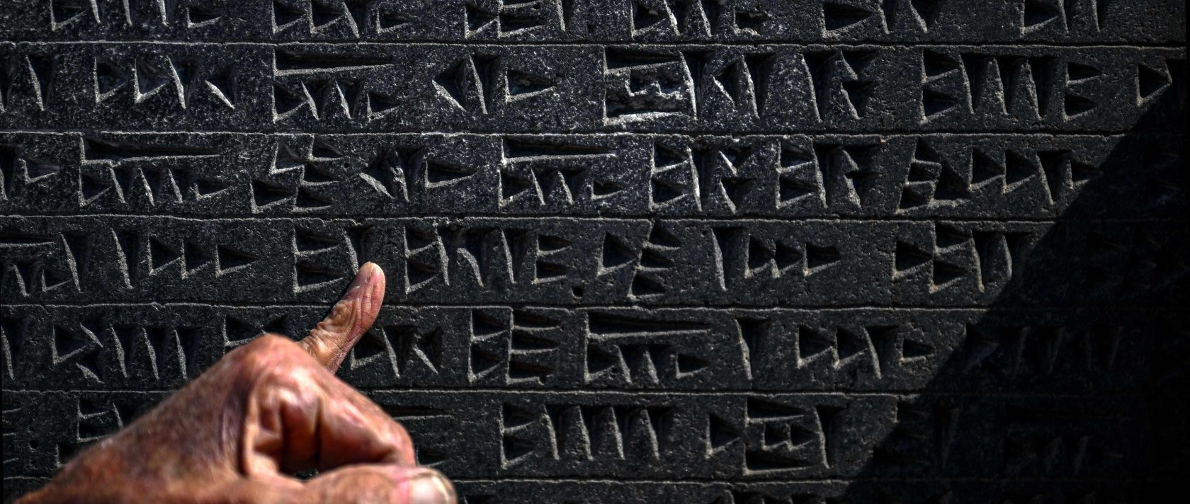A close-up view of a tablet engraved with Urartu language at the fortress of Çavuştepe near Van, Türkiye, July 22, 2026. (AFP Photo)