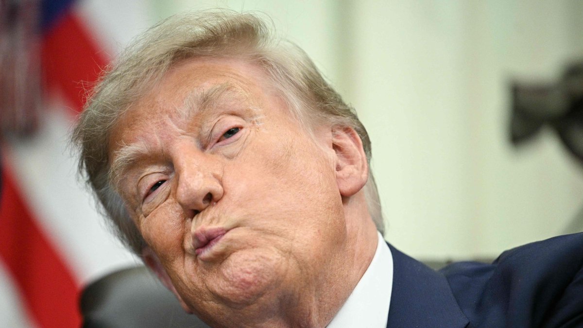 U.S. President Donald Trump looks on before signing an executive order calling for more research and flexibility on vaccines, in the Oval Office of the White House, Washington, U.S., Aug. 10, 2026. (AFP Photo)