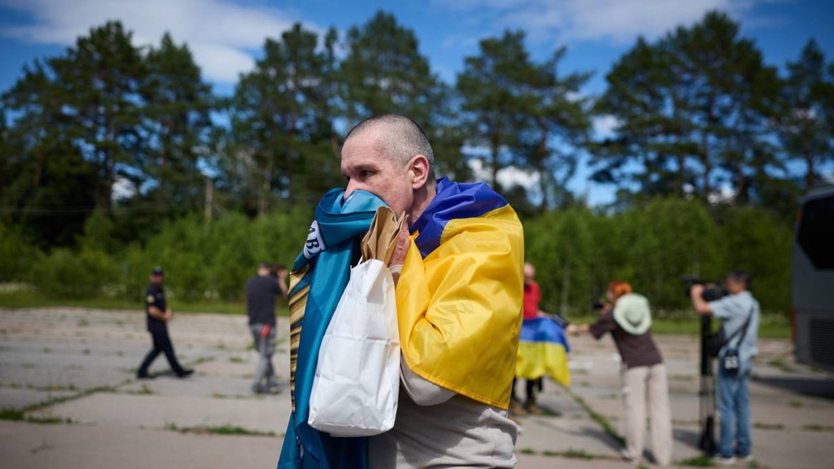 A Ukrainian prisoner of war reacts after a prisoner exchange at an undisclosed location, June 26, 2026. (AP Photo)