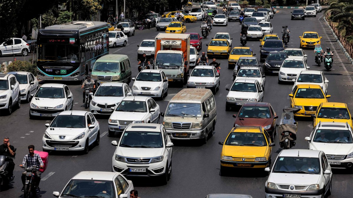 Motorists drive vehicles at Hafteh-Tir Square in central Tehran, Iran, Aug.  8, 2026. (AFP Photo)