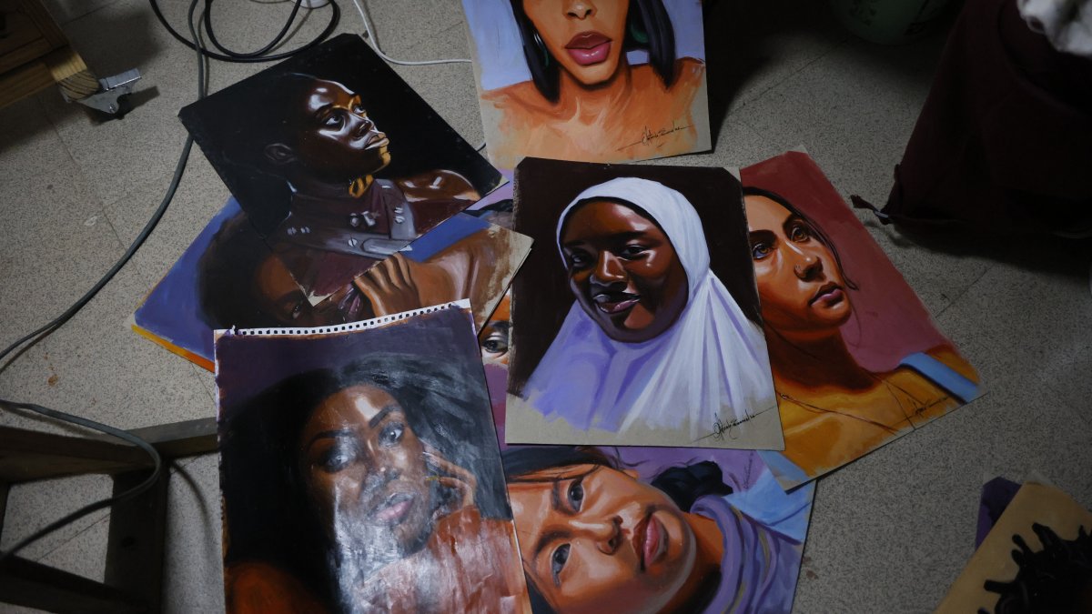 A pile of portraits made by Nigerian artist Emmanuel Olatunde, Abuja, Nigeria, Aug. 11, 2026. (AA Photo)
