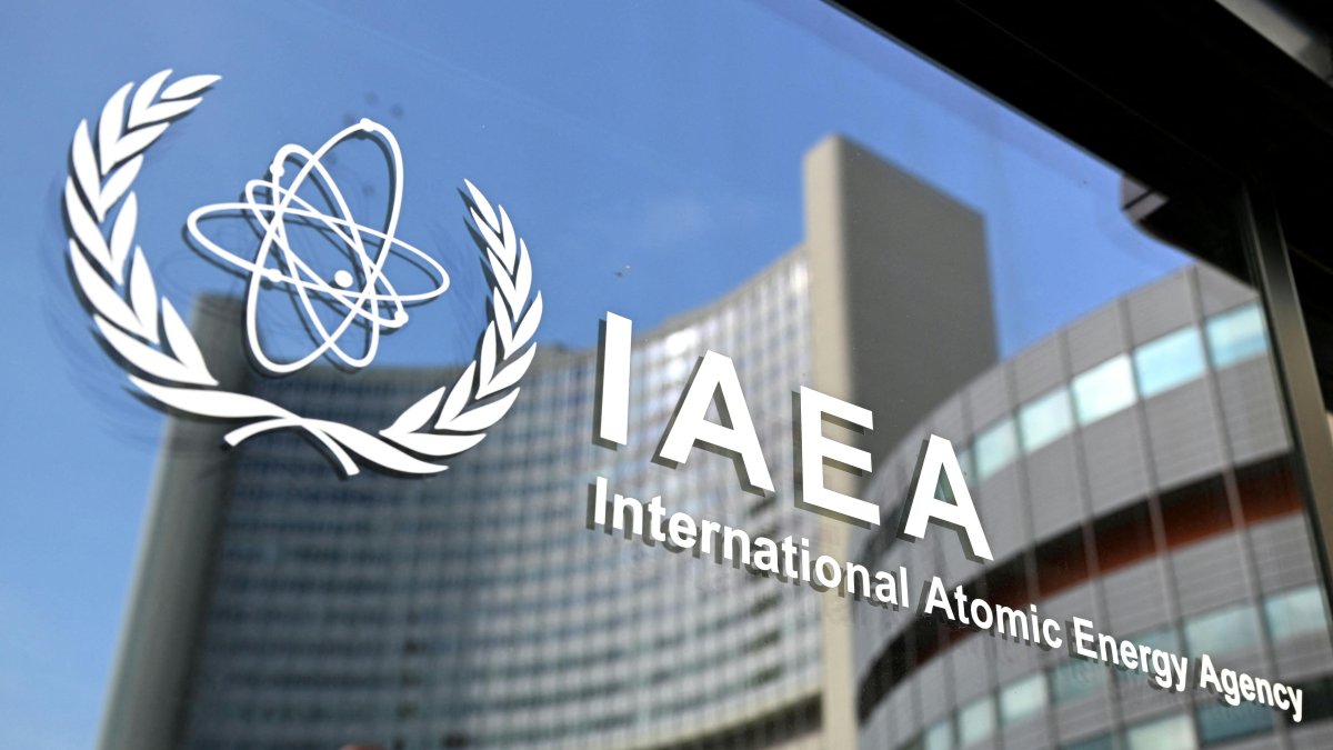 The logo of the International Atomic Energy Agency (IAEA), on the grounds of the Vienna International Centre in Vienna, Austria, March 2, 2026. (AFP File Photo)