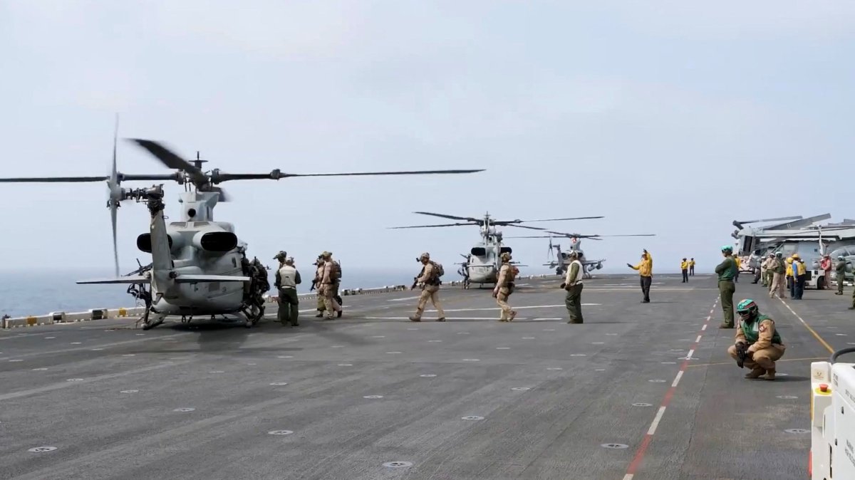 Military helicopters and personnel operate in a location given as the Arabian Sea in this screengrab obtained from a video released by U.S. Central Command (CENTCOM), July 25, 2026. (Handout via Reuters)