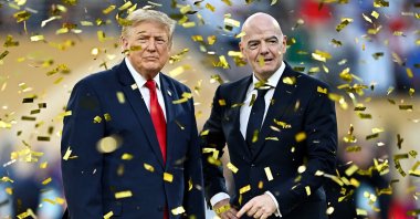 U.S. President Donald Trump (L) and FIFA President Gianni Infantino during the 2026 FIFA World Cup trophy presentation after the final match between Spain and Argentina at New York/New Jersey Stadium, East Rutherford, U.S., July 19, 2026. (Reuters Photo)